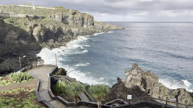 Stormy Winter View from Mirador Charco la Laja Over Volcanic Coast
