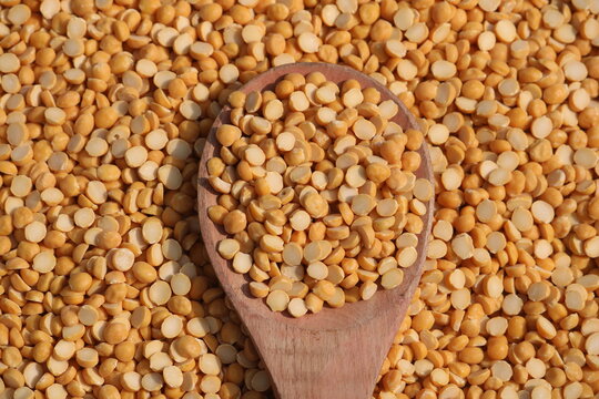 Toor dal is known as tur daal, yellow lentils split peas, indian split pigeon peas, arhar dal, tuvar dal, split peas, Yellow lentils, arahar daal, indian pulses. Concept of vegetarian protein food