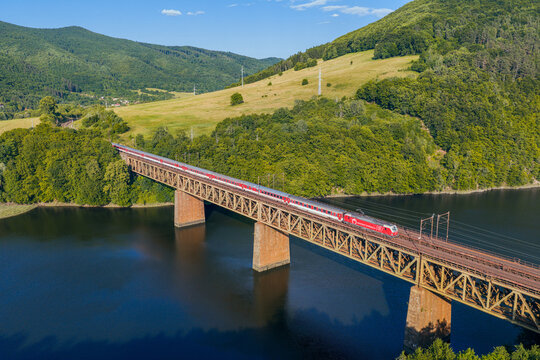 Train Ex 526 Kriv&aacute;ň from Ko&scaron;ice to Bratislava on the bridge over the Mala Lodina dam on the Horn&aacute;d River near the Ruz&iacute;n stop.