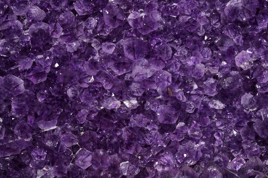 Closeup of a raw Amethyst purple rock with incredible details and resolution.