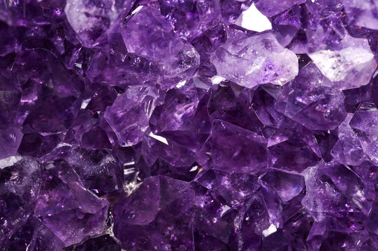Closeup of a raw Amethyst purple rock with incredible details and resolution.