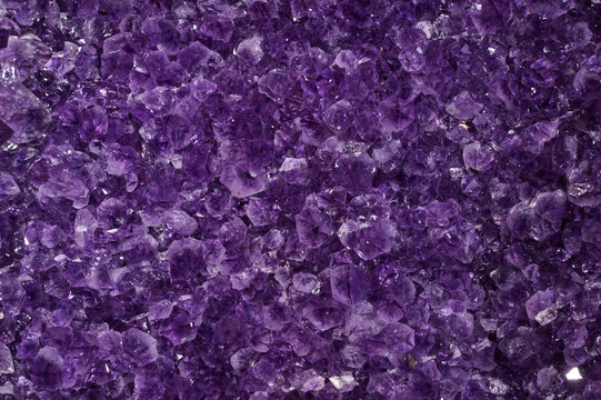 Closeup of a raw Amethyst purple rock with incredible details and resolution.