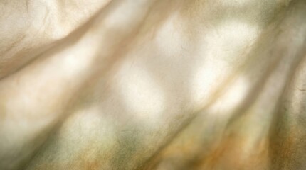Soft, warm, beige fabric with natural light and shadows