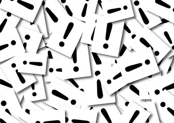 Scattered cards with exclamation mark symbols representing warning