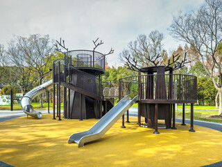 Modern Playground Design with Unique Slides and Natural Elements