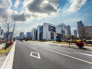 Captivating Urban Landscape Featuring Modern Architecture and Lush Green Pathways