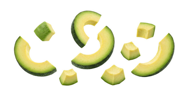 Fresh avocado slices and chunks floating in air