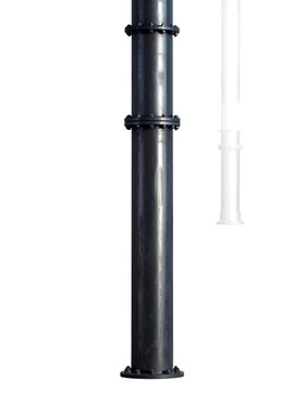 A tall, cylindrical object in a dark hue, segmented by metal rings, stands isolated against a white background; a faint ghosted form is behind