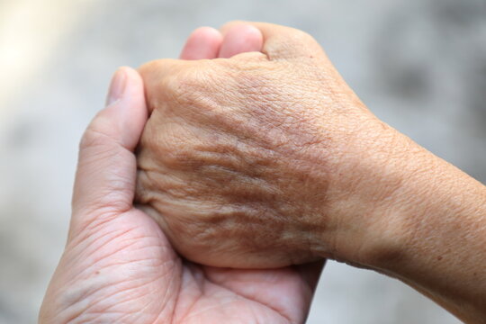 ging hands aging hands aging hands showing wrinkles and age spots, elderly hands, senior skin texture, aging process, healthcare and aging society concept
