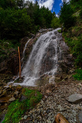 Obraz premium Hiking Trail to the Egger Waterfalls in the Antholz Valley South Tyrol in autumn 2025