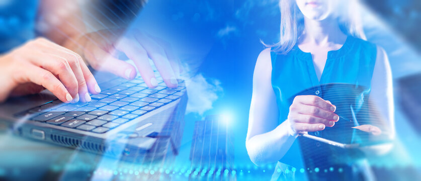 Digital business communication combines laptop data entry and mobile device interaction. Online collaboration, cloud services, remote work and modern information workflows.