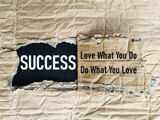 Torn box paper with success written on it, love what you do, do what you love, success concept, getting success with the right job © AhmadYani