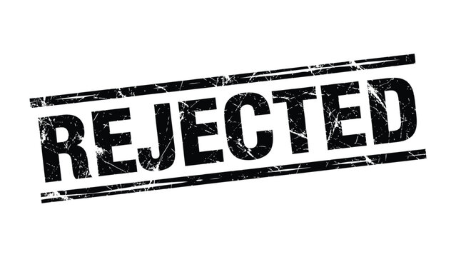 Stamped with finality: A stark black 'REJECTED' stamp, a symbol of denial and refusal, prominently displayed on a clean surface.