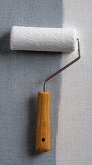 Obraz premium Close-up View of Paint Roller for Wallpaper Application on Smooth Surface