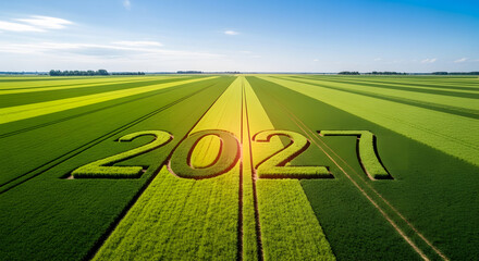 Cereal crop field with year 2027 mown into green agriculture plantation