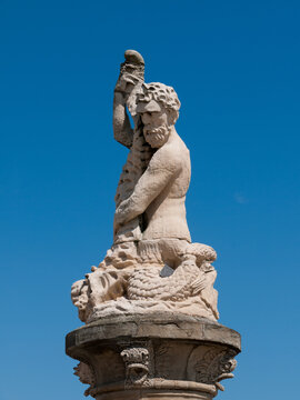 Statue of Triton the mythical son of Poseidon and Amphitrite, fish-tailed sea-god, on the Seafront in Lowerstoft, Suffolk, England, UK 