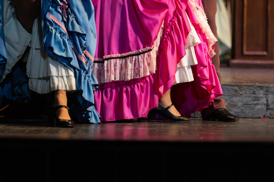 Actors in Vintage Costumes Performing a Cabaret or Period Dance on Stage