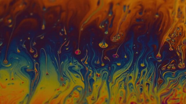 macro video of a colorful soap bubble surface with smooth flowing liquid waves and rich organic textures. Abstract natural motion background for web design, presentations, science visuals, creative