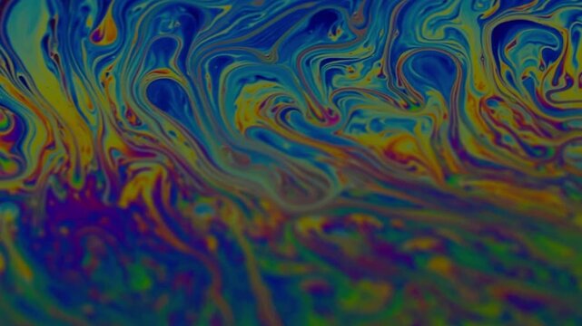 macro video of a colorful soap bubble surface with smooth flowing liquid waves and rich organic textures. Abstract natural motion background for web design, presentations, science visuals, creative