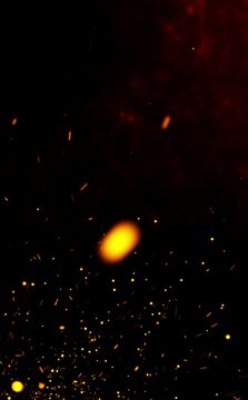 Rising fire flakes on the night sky with the feeling of a huge fire. Bright fire particles flowing with the wind. Bonfire background animation. Flowing fire ashes in the night. Cinematic intro. 4k.
