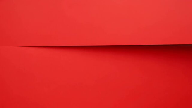 Sleek and modern abstract background with a single horizontal incision on a bold red surface, creating a sharp shadow line for a minimalist design