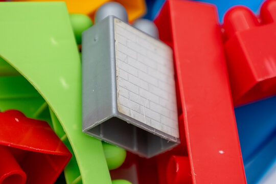 Colorful plastic building blocks close up view