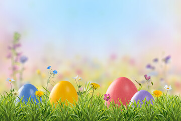 Fototapeta premium Holiday Easter card with colorful eggs in green grass and flowers