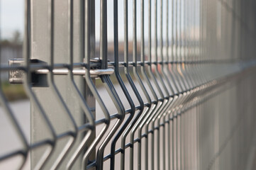 Metal fence made of 3D sections