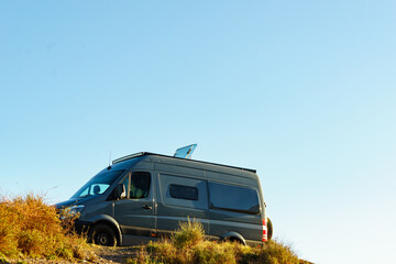 Caravan van camping on nature. © Voyagerix
