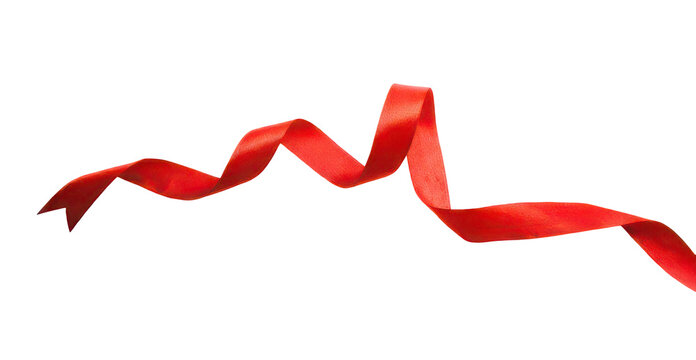 A vibrant red ribbon flowing and twisting across a white background
