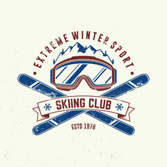 Obraz premium Extreme winter sport. Vector ski club retro badge. Concept for shirt, print, seal or stamp with mountain, ski, ski glasses. Family vacation, activity or travel. For logo design, patches
