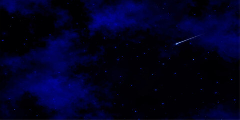 A vibrant nebula glows within a dark starry night sky background featuring an abstract galaxy of blue light and cosmic dust across the outer space universe © Graph Rover