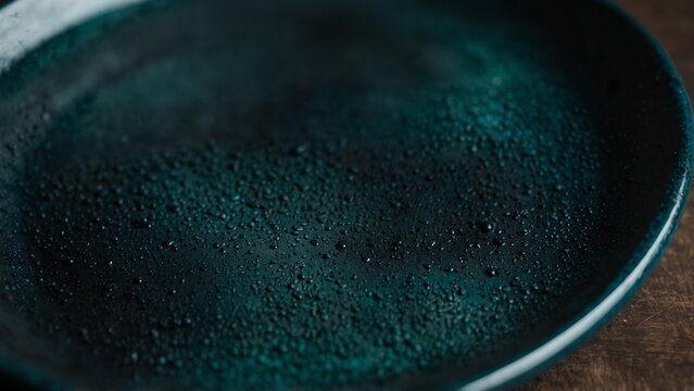 Black plate sitting on top of wooden table, digital art illustration - Generative AI