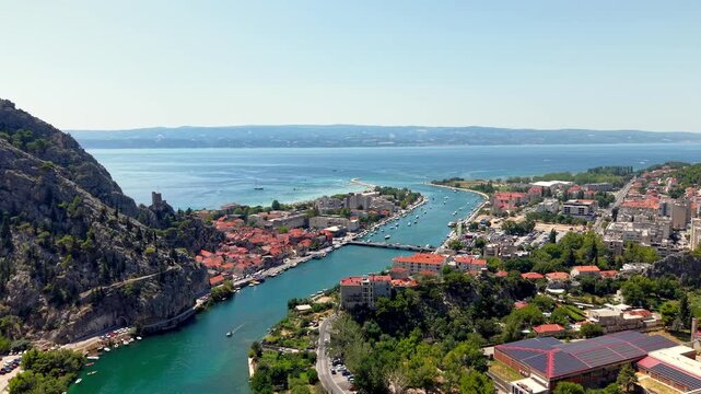 Aerial view of Omis town at Cetina River canyon meeting Adriatic Sea Dalmatia Croatia