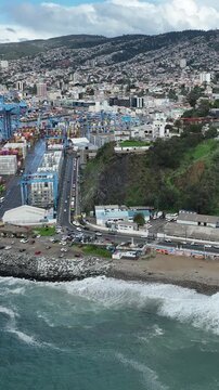 Vina del Mar in Chile with a rainbow. Beautiful aerial image of the coastline. Aerial view, vertical video