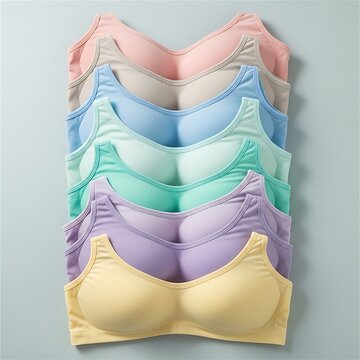 A colorful array of lace-trimmed bras displayed in a visually appealing stack