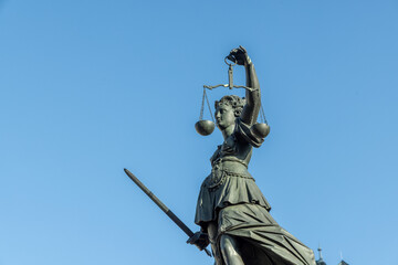 statue of lady justice - Justitia -in Frankfurt with scale and swordv