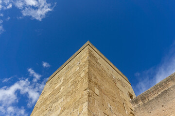 Torre de Belen Medieval Gate Tower in Cordoba Spain Historic City Walls Architecture of Andalusia under Bright Blue Sky