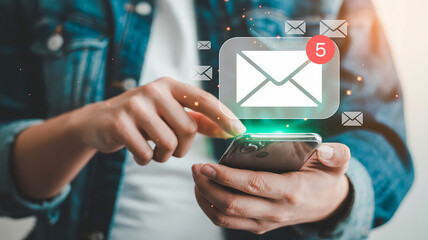 Person using smartphone with email notifications and incoming messages mobile phone