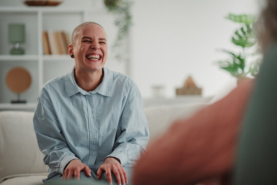 Young person smiling during support counseling session