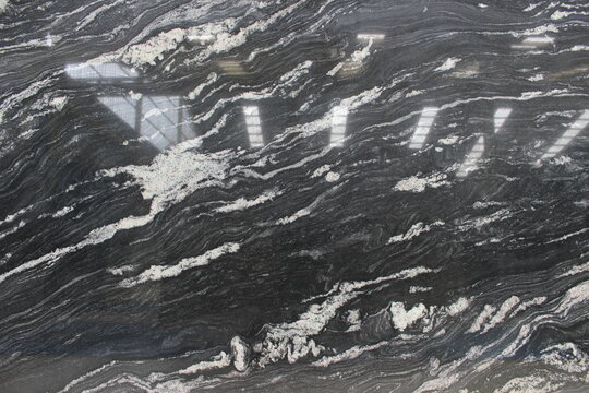 Via Lactea black marble texture with fine white veins resembling the milky way galaxy for premium decorative applications.