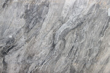 Grigio Carnico marble texture from Italy dark grey color with contrasting and dramatic thick white veins for flooring.