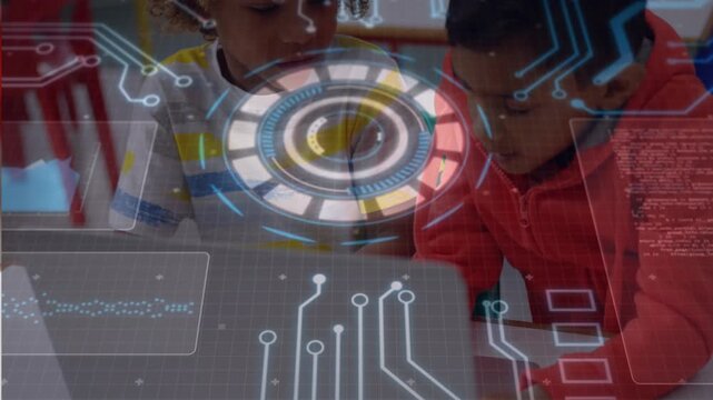 Two boys placing hands on laptop keyboard, right child initiating HUD animation for class work
