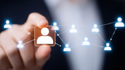 Finger selecting a user icon in a connected network representing recruitment and talent sourcing.
