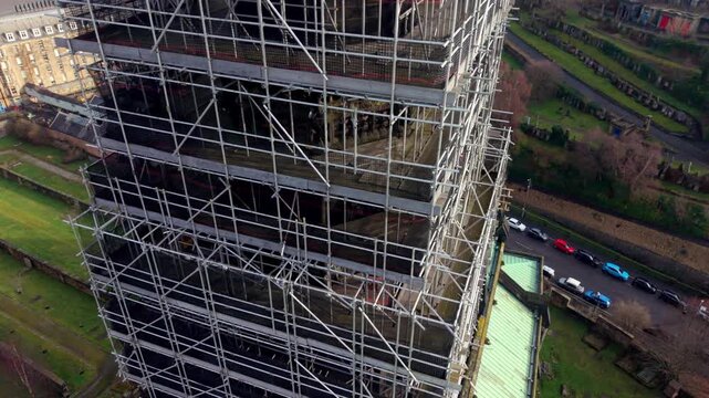 Aerial drone orbit around Glasgow Cathedral during restoration works in Scotland