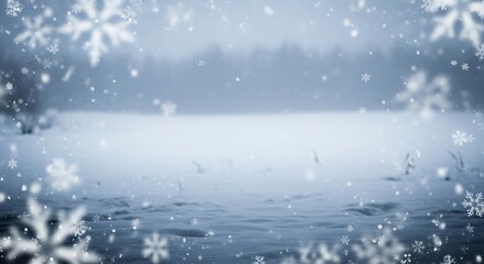 Snowy winter lake with falling snowflakes and bokeh light abstract Christmas background