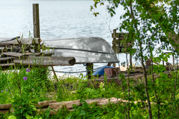 Aluminum Boat In Dry Dock Along The River In Summer In Wsconsin