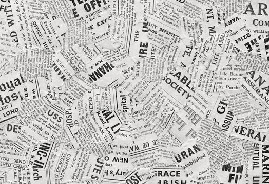 A full-frame collage of torn newspaper pieces. Overlapping layers feature various fonts with rough, ripped edges, creating a busy monochromatic background for media design.