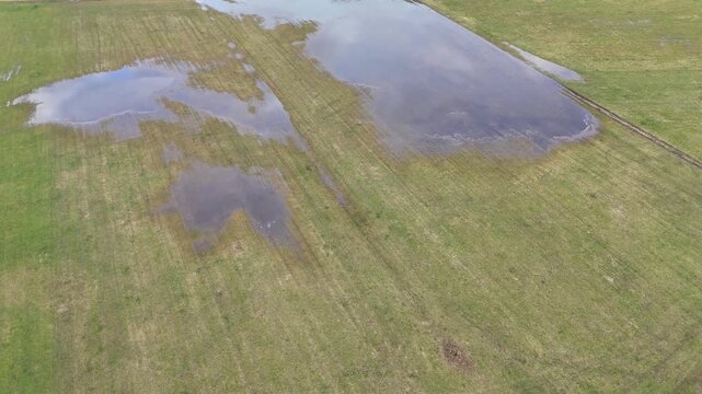 Aerial View of Flooded Agricultural Field with Standing Water
