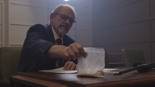 Criminal Trial lawyer in court pointing to notes - modern court room scene
